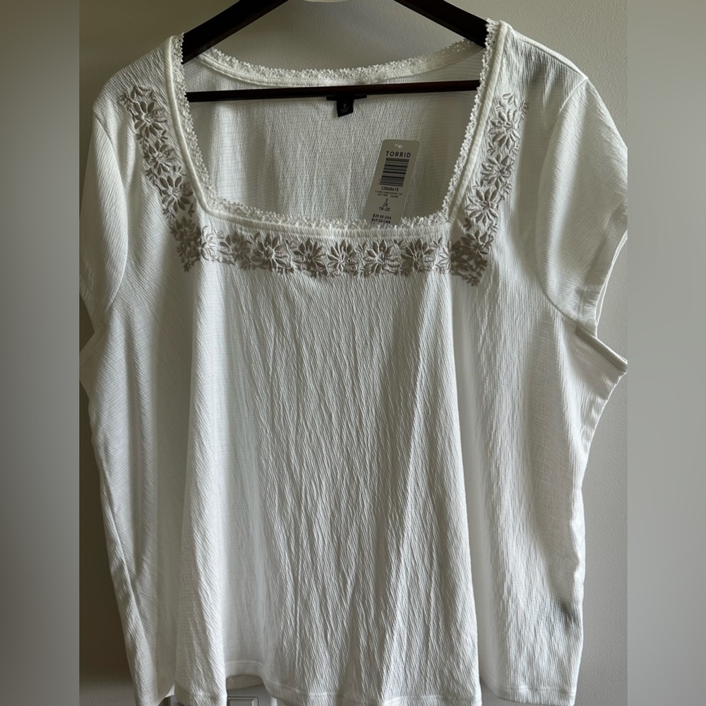 NWT. Torrid Ivory Embroidered Top